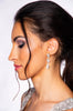 Woman with silver swarovski crystal rain drop earrings