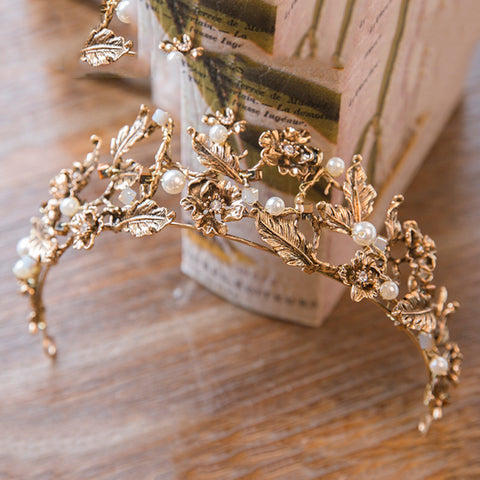 Gold tiara with flower design and pearls june avenue